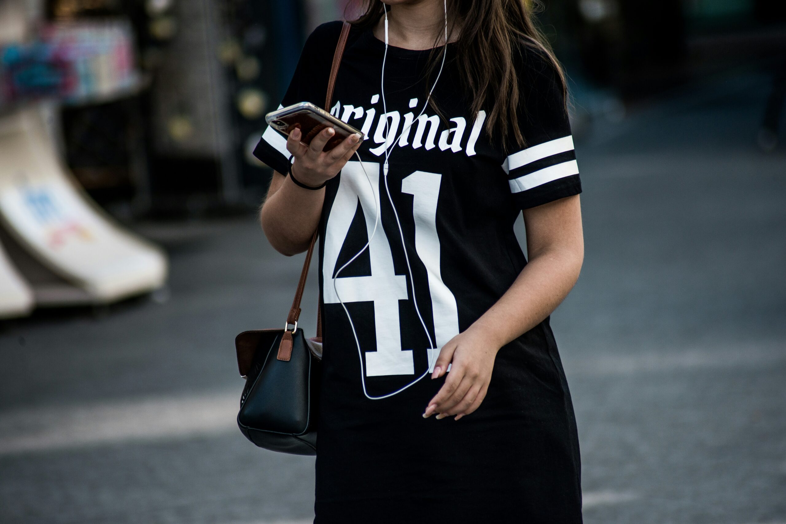 A model showcasing different interchangeable bands paired with matching outfits.