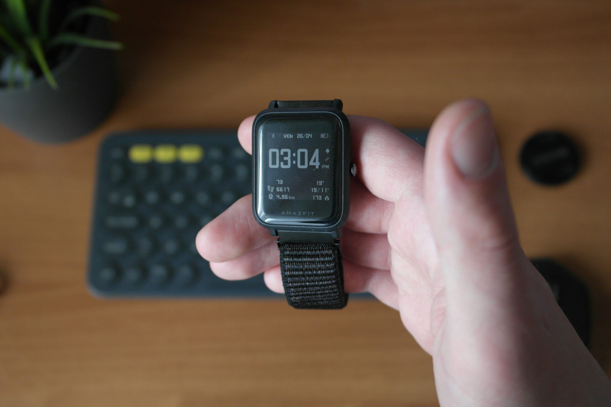 A sleek smartwatch displaying health metrics on its screen.
