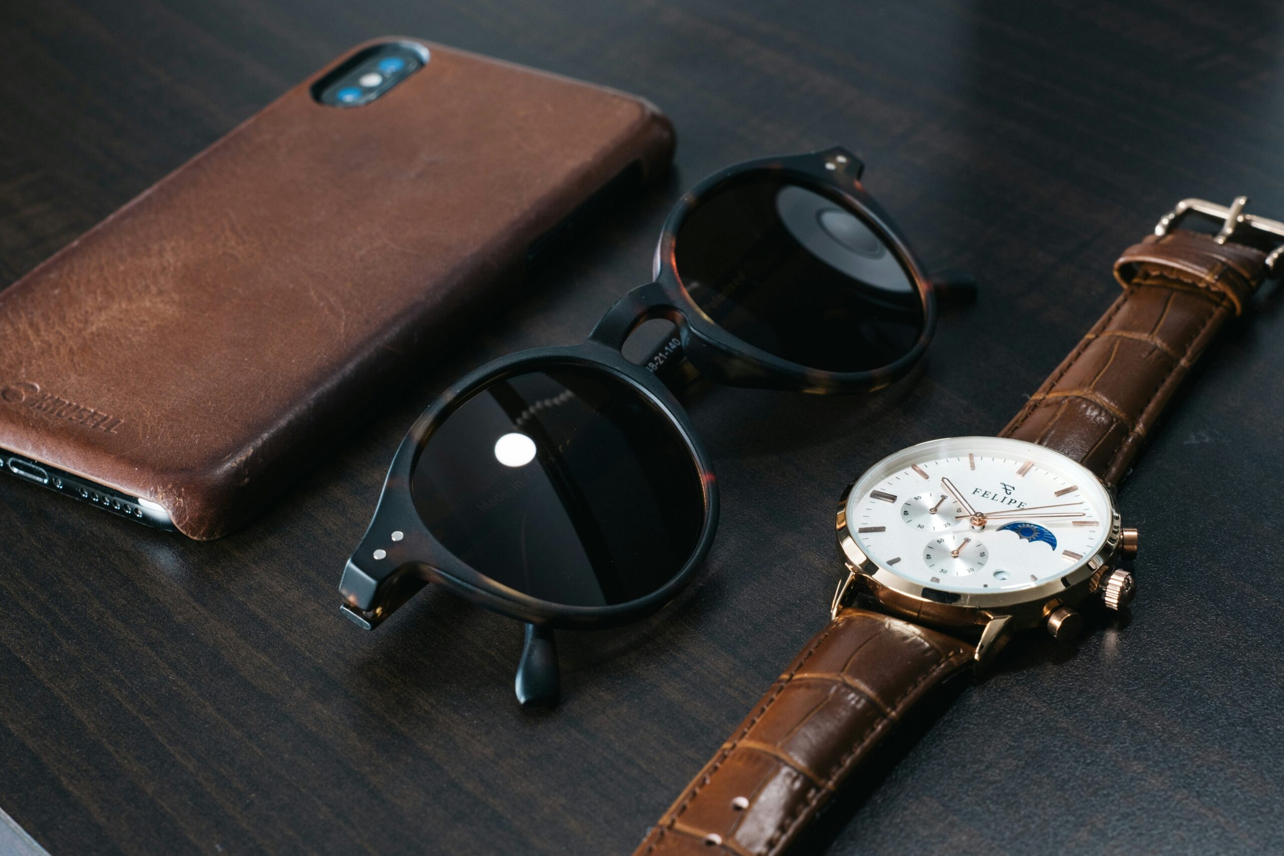 A bulky smartwear piece contrasting sharply against formal clothing