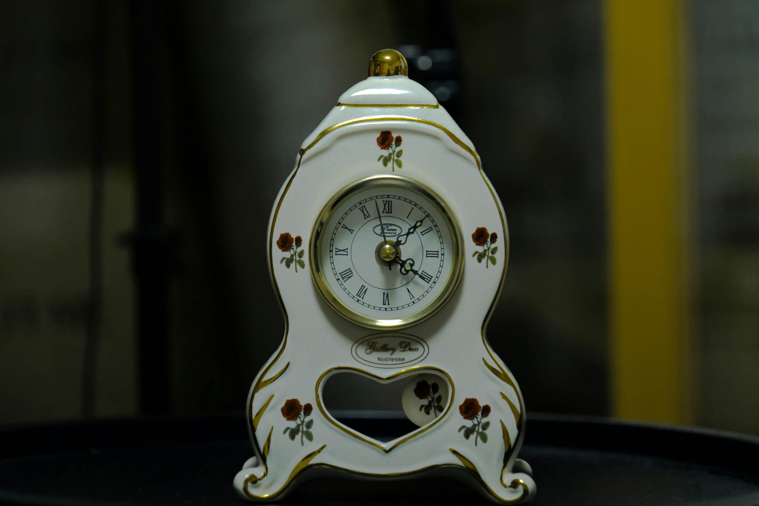 Closeup of a high-end ceramic watch showcasing its polished surface.
