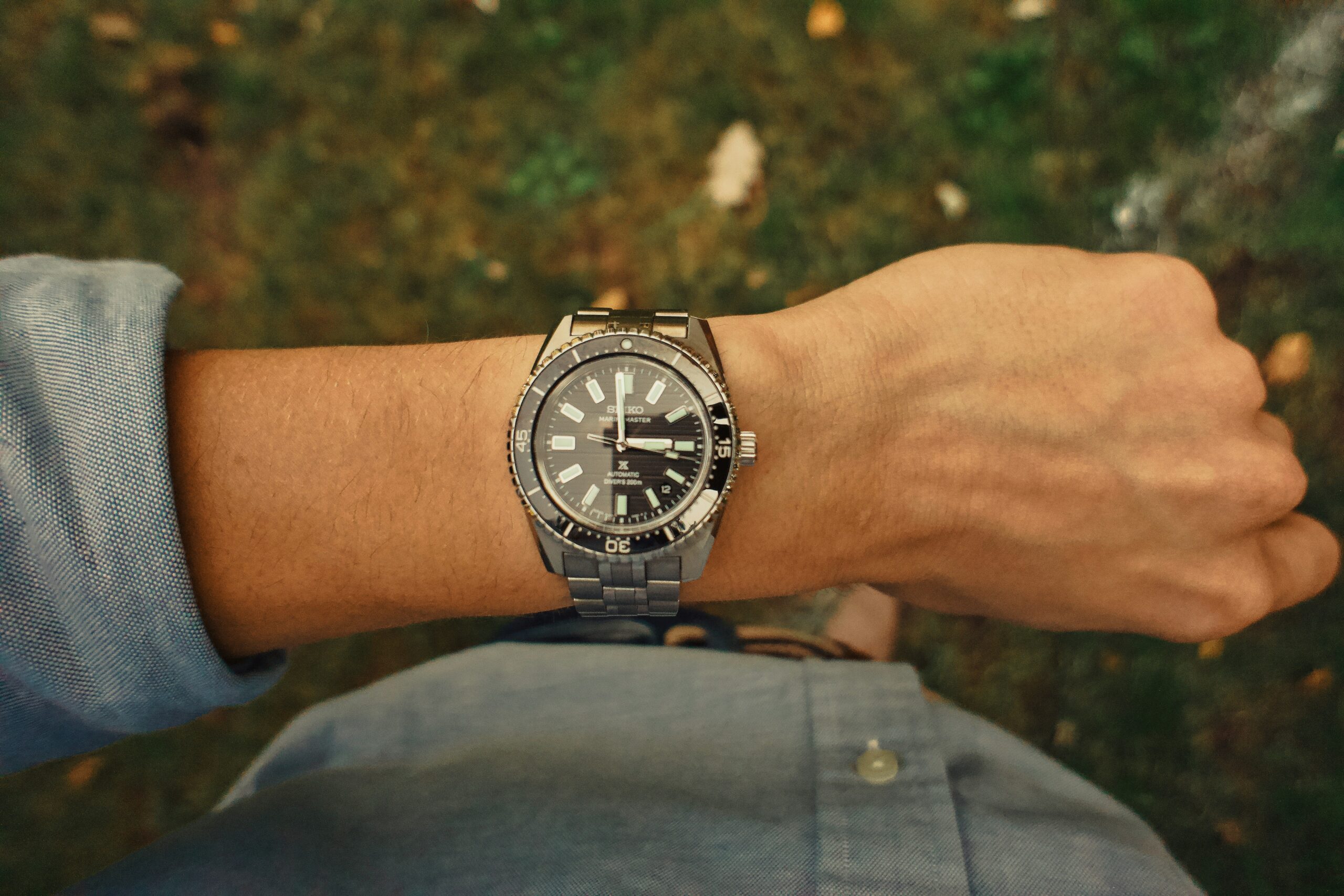 Hybrid smartwatch featuring a classic analog dial combined with subtle digital features.