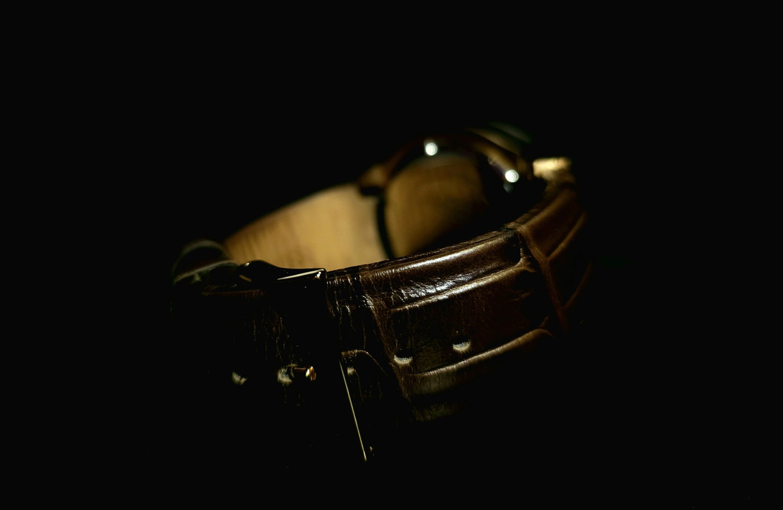 Closeup of various leather straps showcasing textures
