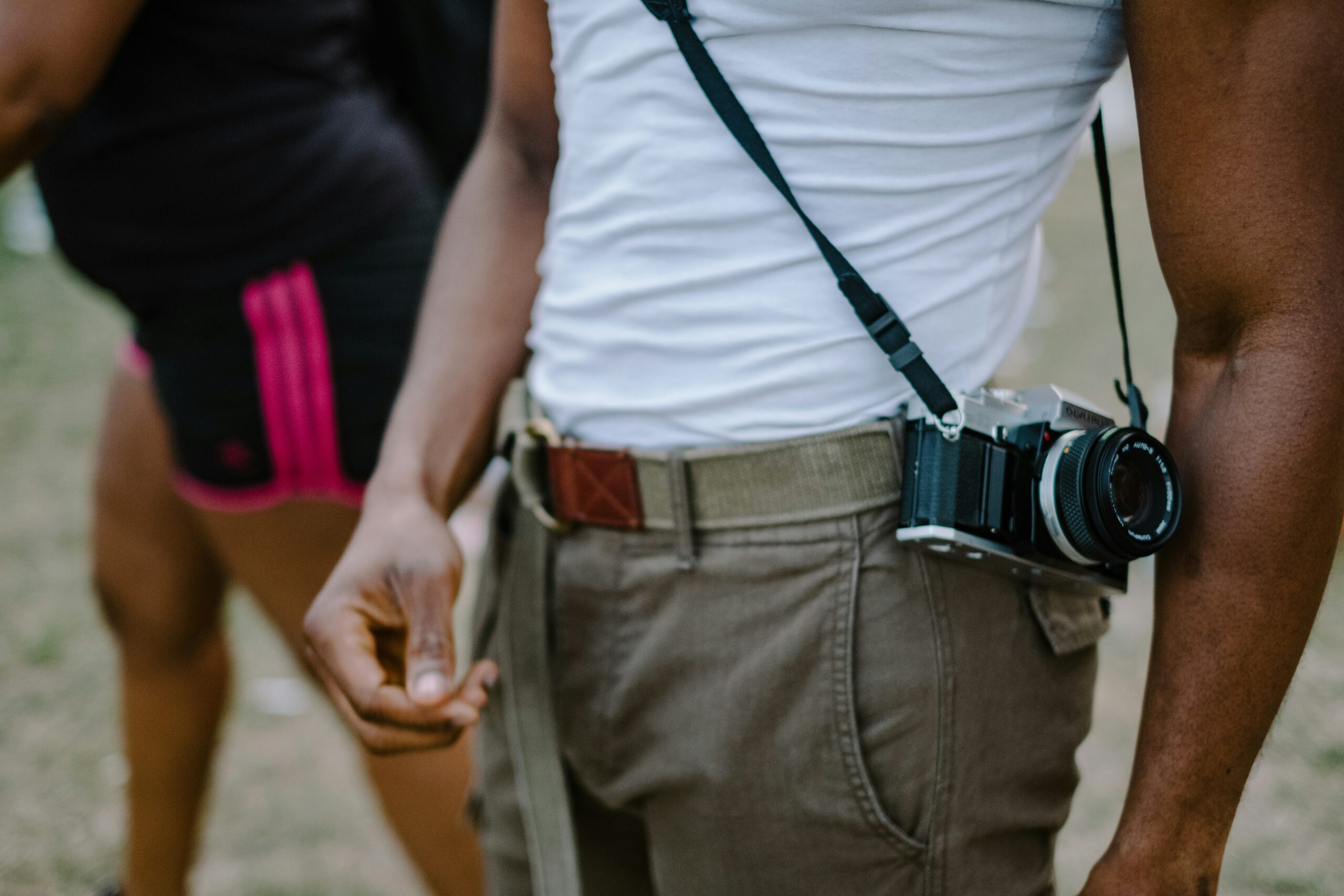 Two lifestyle shots showing people wearing fashion watches styled differently
