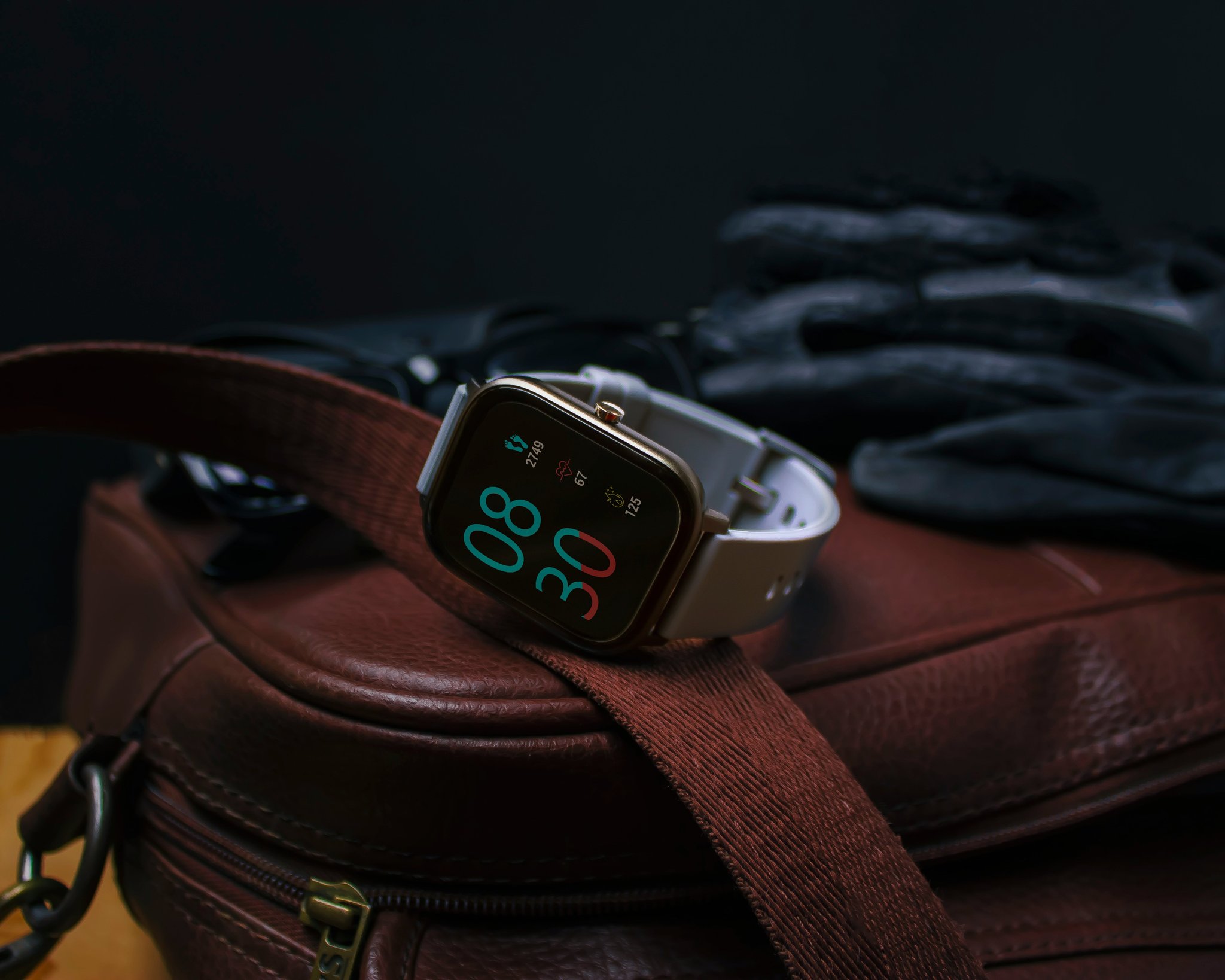 Close-up of colorful leather watch straps showcasing various shades and textures