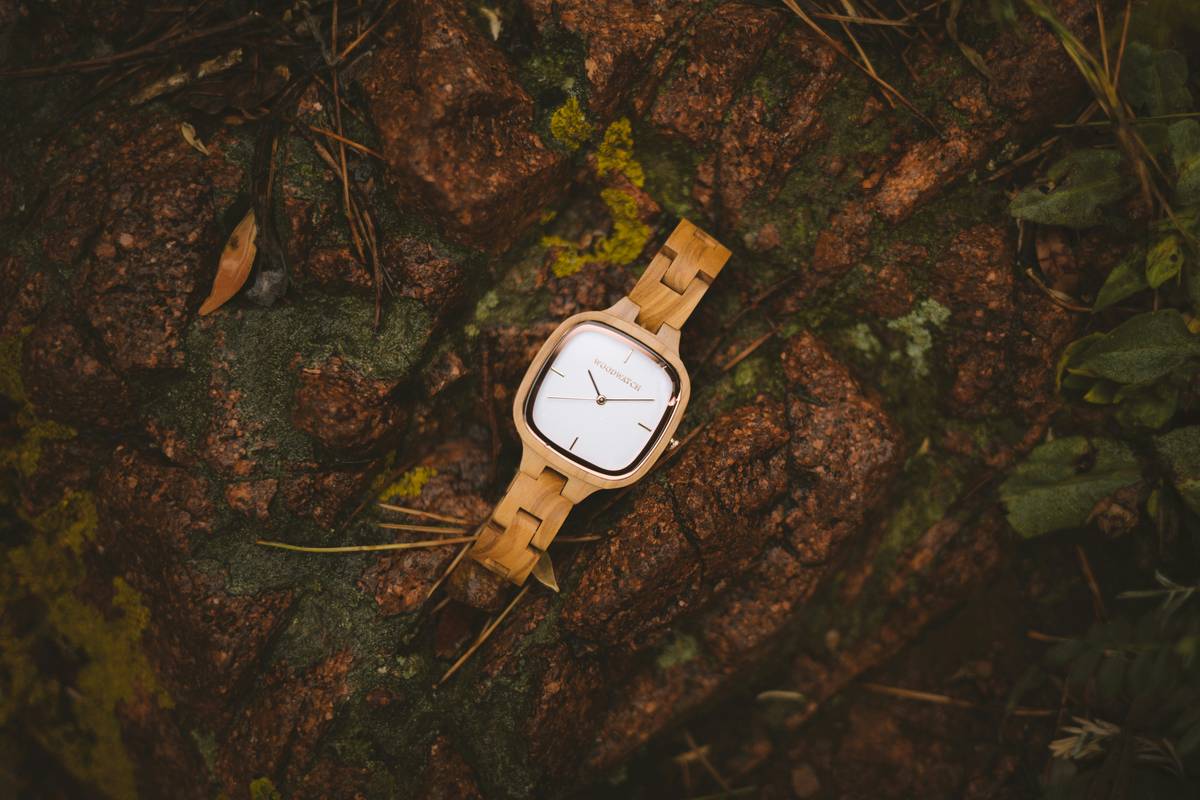 Comparison chart showing different wood types and designs in watches