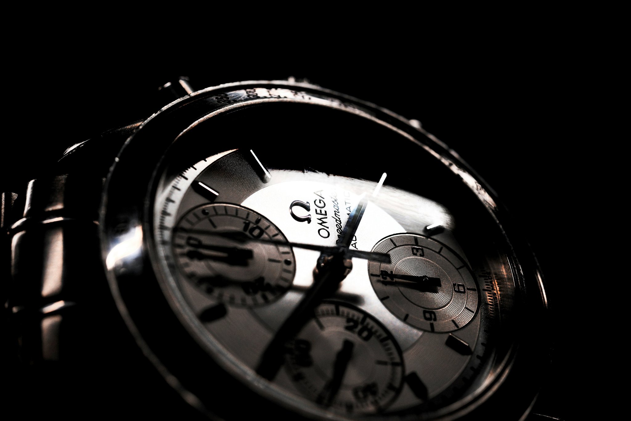 A close-up shot of a platinum watch showcasing its scratch-resistant surface