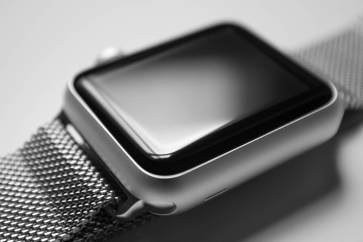Spread of three interchangeable watch faces highlighting customization options.