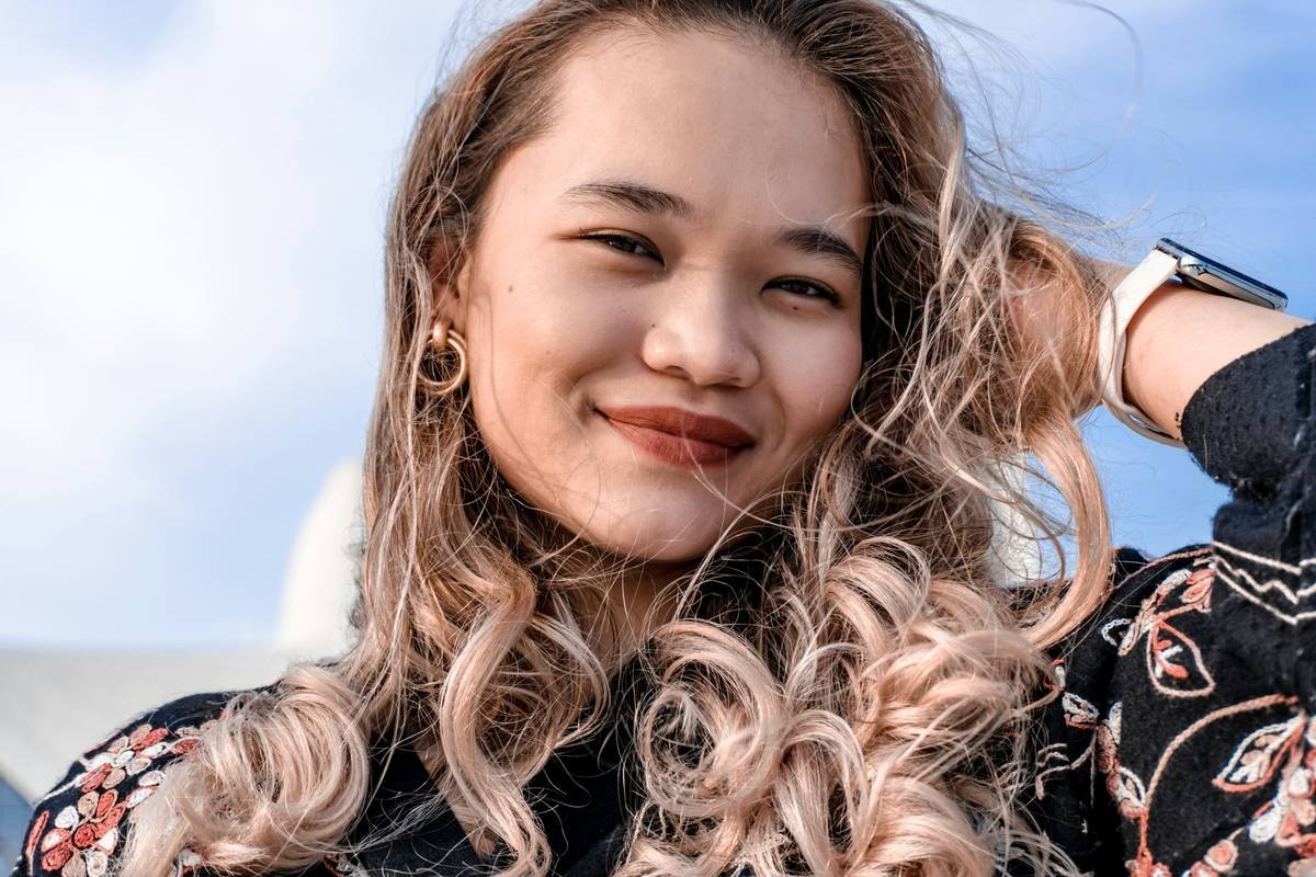 Before/after dashboard showing Marcus's emotional energy metrics improving over 8 weeks with expressive watch face