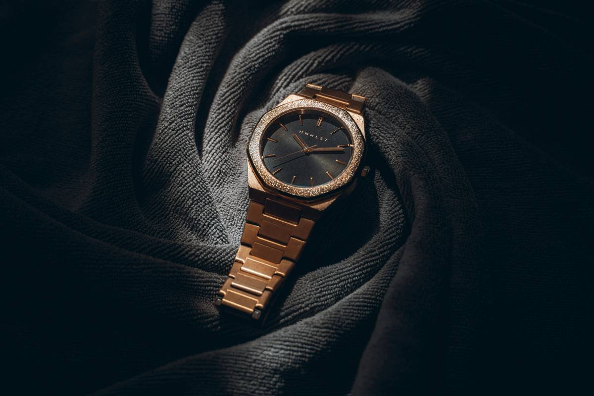 close-up of fossil brand watches stainless steel case and analog-digital dial