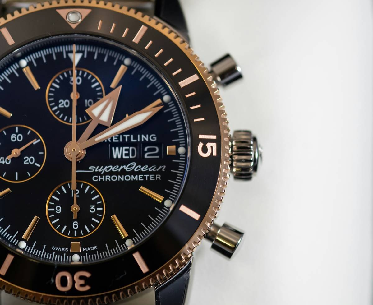 Close-up of high-quality material fashion watche showing brushed stainless steel case and leather strap